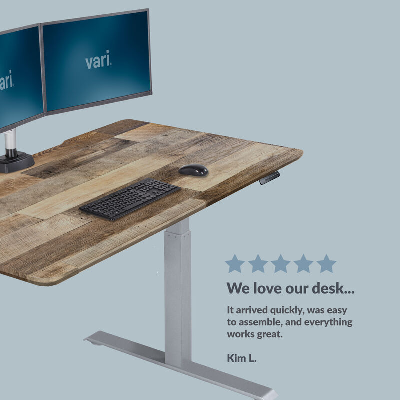 Front view of a electric standing desk with a five star rating with a customer review on the bottom of the image saying "We love our desk... It arrived quickly, was easy to assemble, and everything works great." image number null