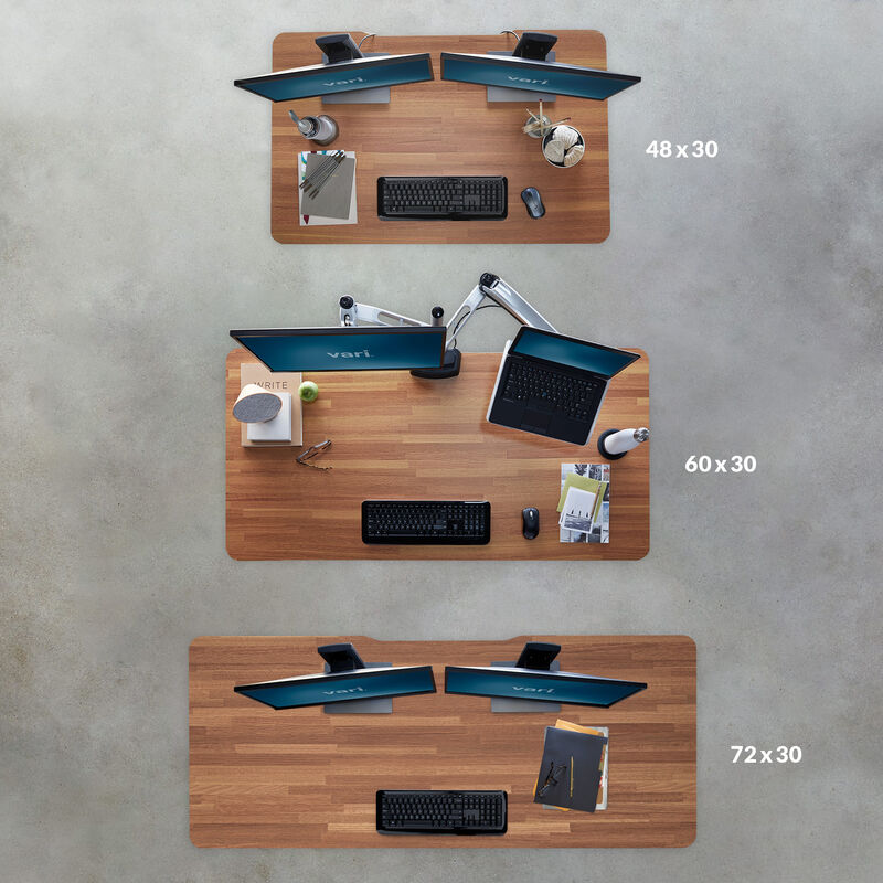 overhead image of three different sizes of electric standing desks image number null