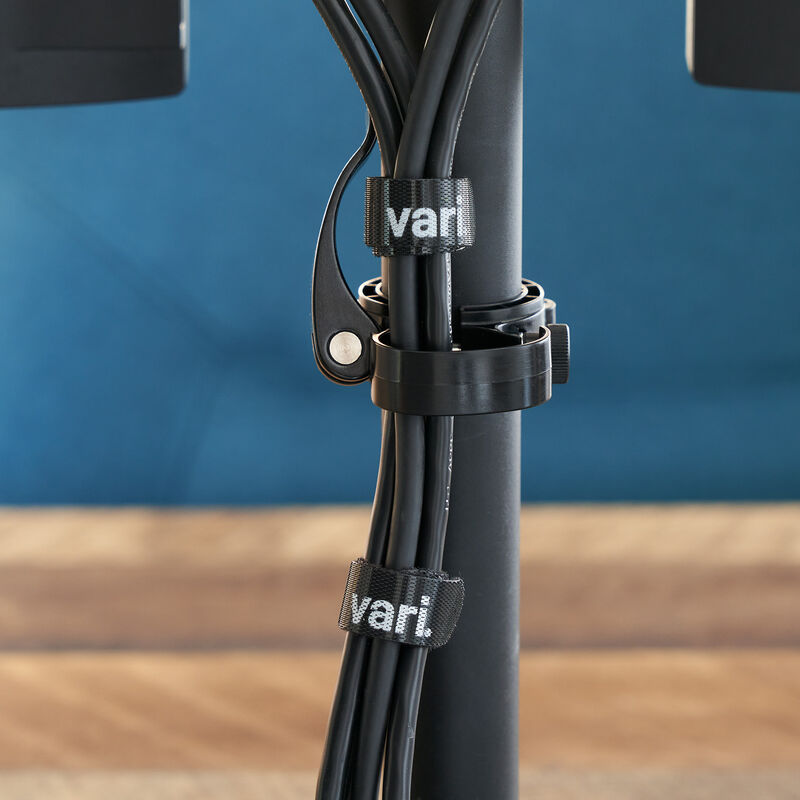 cable strap in use around three power cords image number null