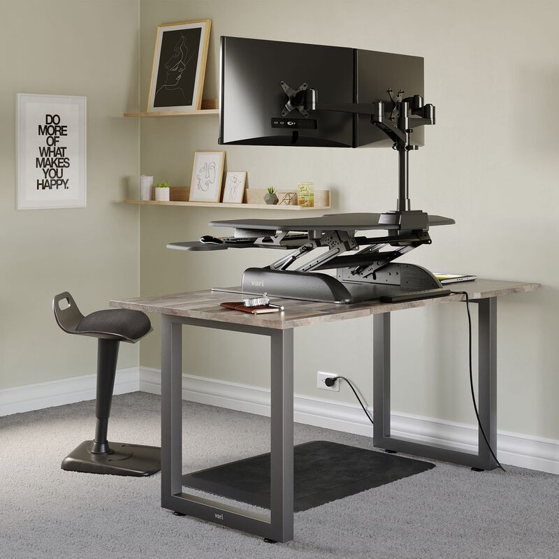 Space-Saving - Corner Converter Workspace is comprised of cube corner 36, power strip 8 feet, dual monitor arm 180 degree, active seat, and mat 34 by 20 image number null