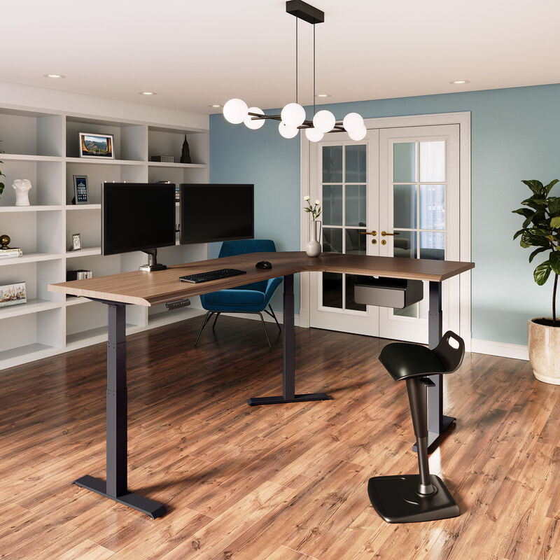 walnut finish l shape electric standing desk in a raised position in the corner of a workspace image number null