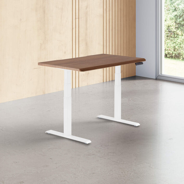 walnut finish standing desk top with white legs in a open office image number 0