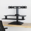 varidesk electric dual monitor converter in black in a raised position straight on