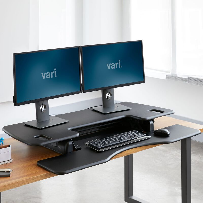 VariDesk Pro Plus 48 Black sit-stand desk converter lowered in office  image number null