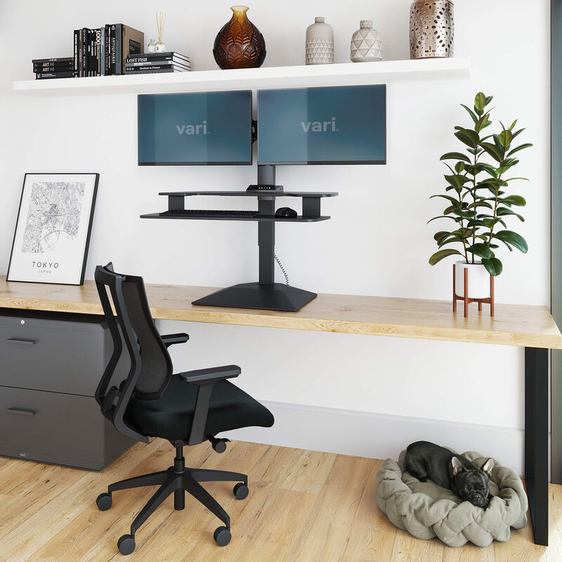 varidesk electric dual monitor converter in black in a raised position on desk  image number null