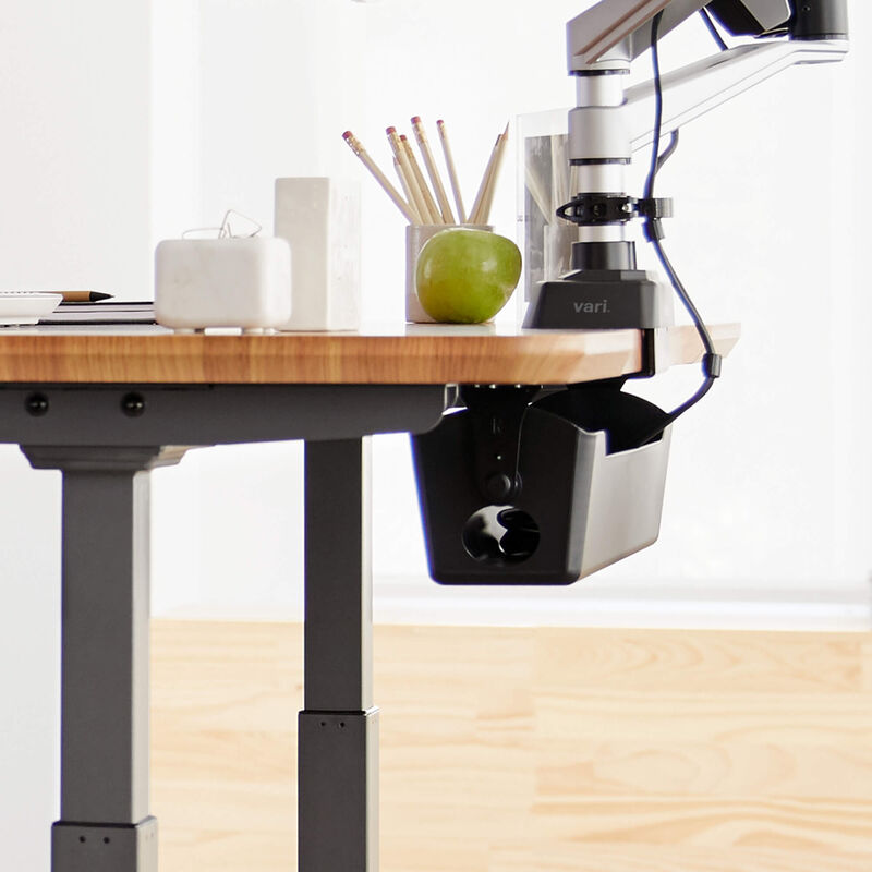 Cable Management Tray in Black attached to the Vari Electric Standing Desk in office image number null