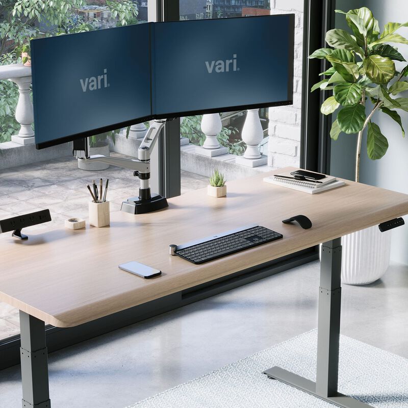 curved edge desk highlighting all the accessories that will fit on the desk image number null