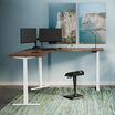 l shape electric standing desk eighty by eighty in a raised postion