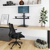 varidesk electric single monitor converter in black in a raised position on desk 