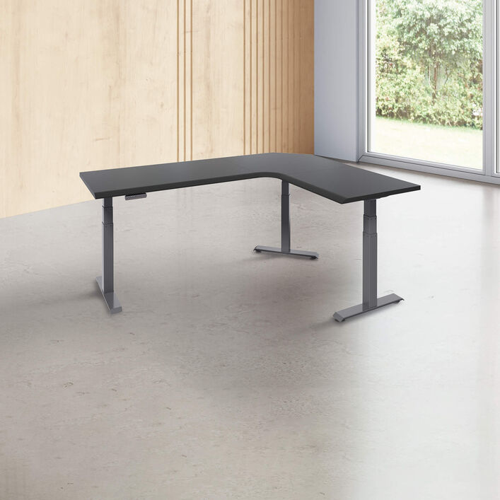 L-shape desk with a black finish desk top with slate legs in a open office image number 0