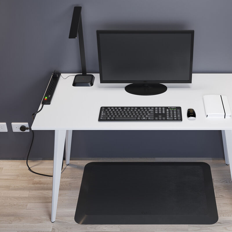 workspace setup with a table and desk accessories image number null