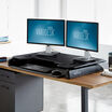 varidesk cube plus 48 in black lowered in an office