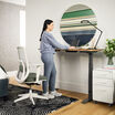 vari ascent chair in eucalyptus in home office setting with professional standing