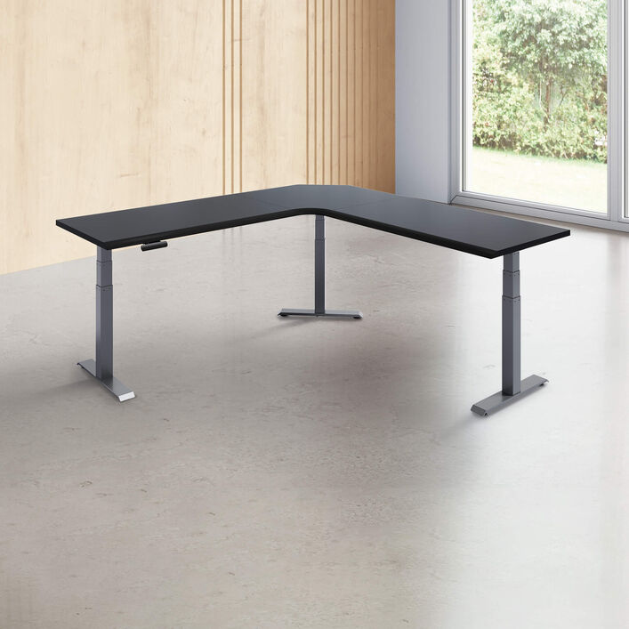 L-shape desk with a black finish desk top with slate legs in a open office image number 0