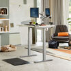 Electric Standing Desk 48x30 White in raised position at home