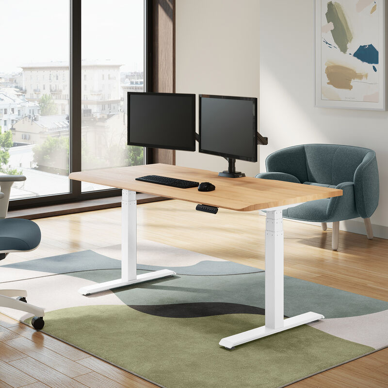 solid wood electric standing desk with a white oak top with white legs in an open home office in lowered position image number null