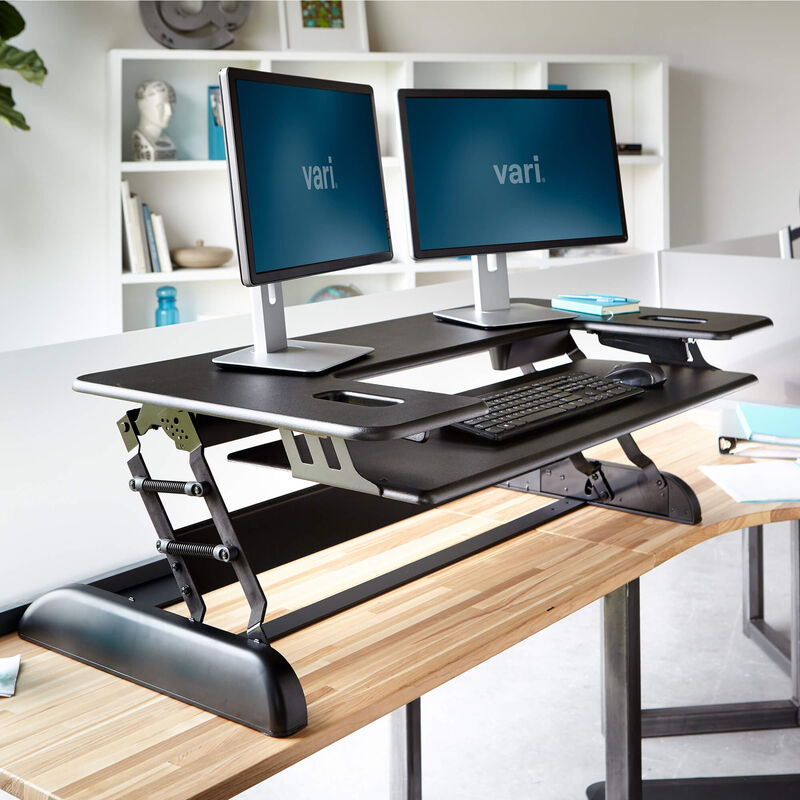 varidesk cube plus 48 in black raised in an office image number null