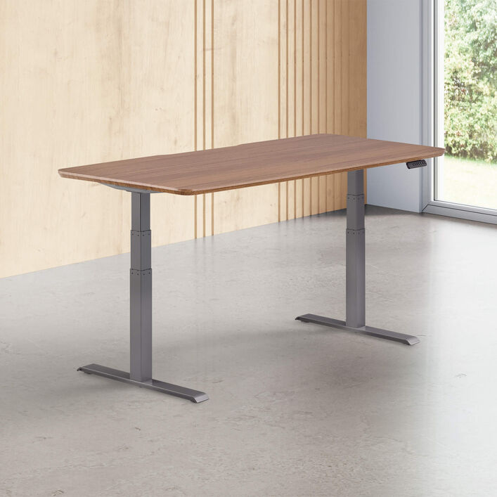 walnut finish standing desk top with slate legs in a open office image number 0