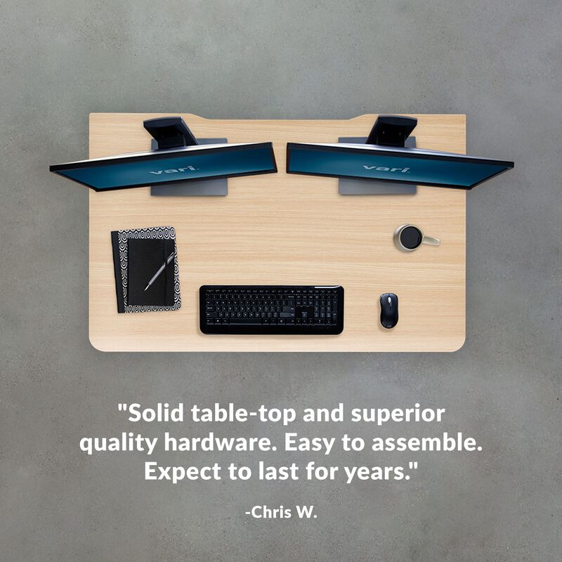 chris states solid table-top and superior quality hardware easy to assemble expect to last for years with a five star review with top view of desk showing  image number null