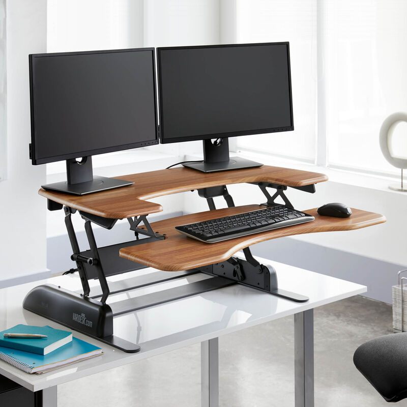 VariDesk Pro Plus 36 Butcher Block sit-stand desk converter in raised position in office  image number null