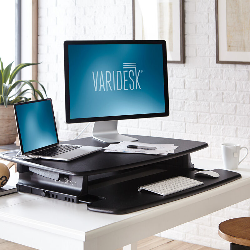 VariDesk Pro 36 Black sit-stand desk converter lowered in office  image number null