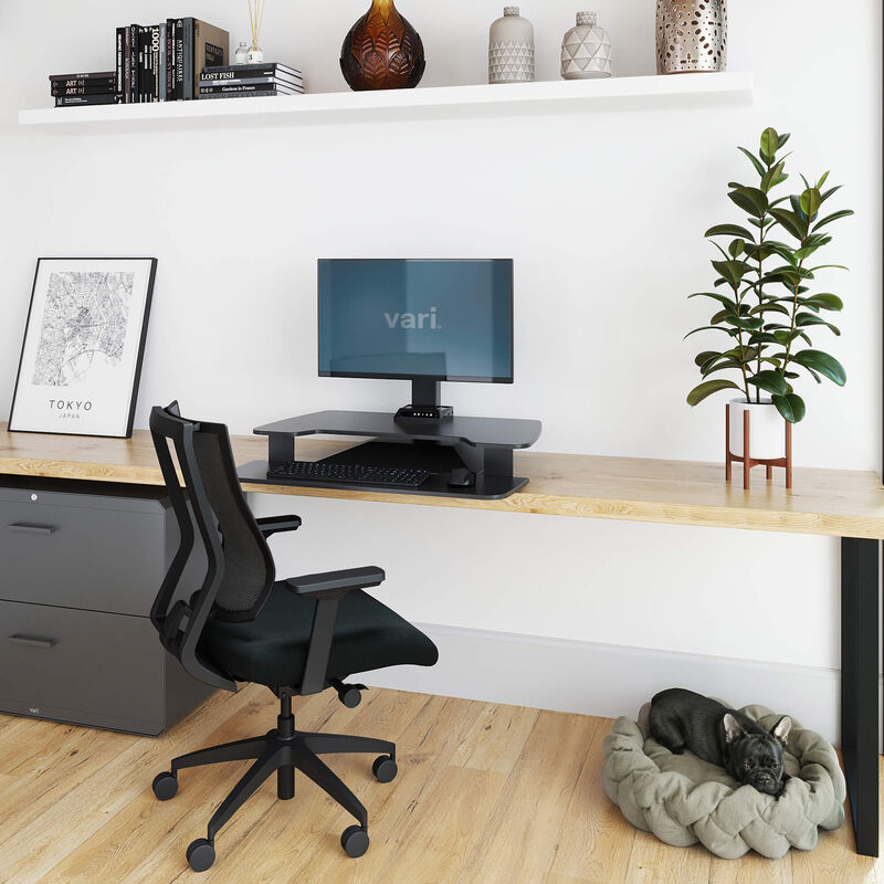 varidesk electric single monitor converter in black in a lowered position on desk  image number null