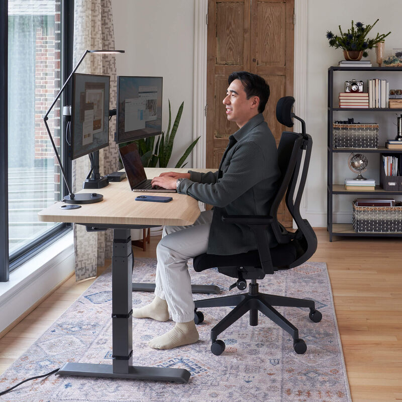 standing desk in a home office remote setting image number null