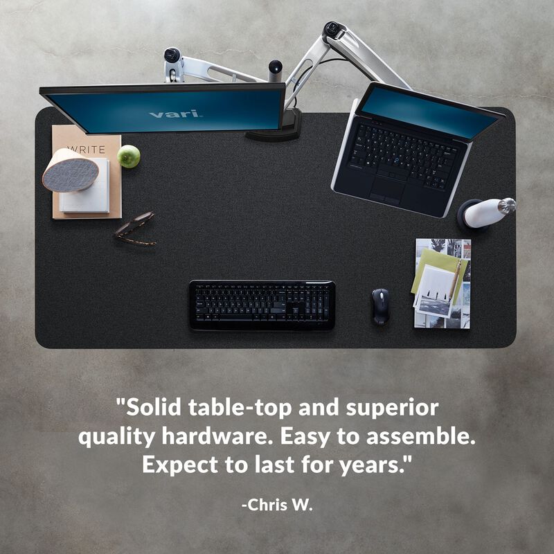 Overhead view of standing desk with a quote at the bottom of the image saying "Solid table-top and superior quality hardware. Easy to assemble. Expect to last for years." image number null