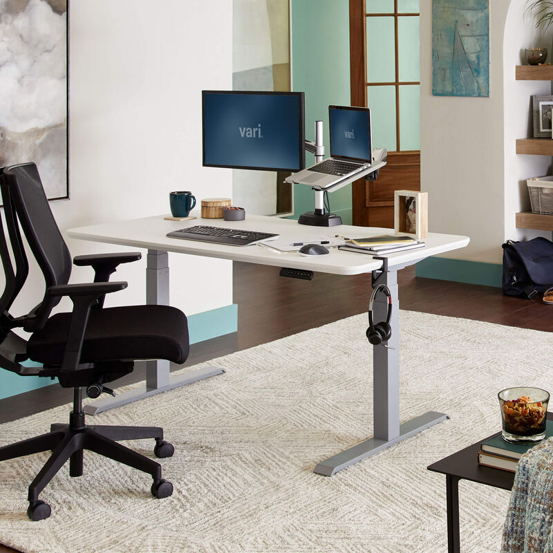 Electric Standing Desk 60x30 white in lowered position at home image number null