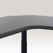 curved view of the black finish l shape electric standing desk