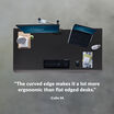 colin m. stated the curved edge makes it a lot more ergonomic than flat edged desks under an overhead image of a desk