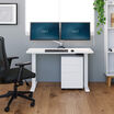 vari essential electric standing desk in office setting