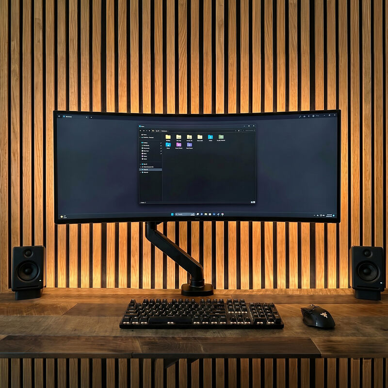 showing ultra wide monitor set up on office desk image number null