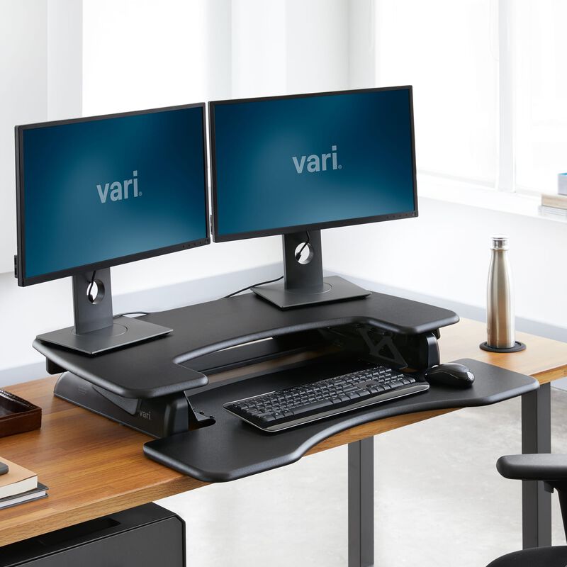VariDesk® Pro Plus™ 36 Black sit-stand desk converter in lowered position in office image number null