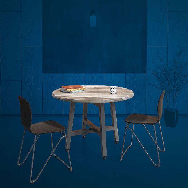 Two side chairs next to a round table in break area image number null