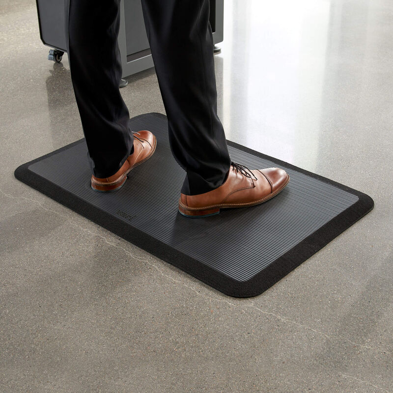 individual standing on a standing mat image number null