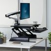 vari essential 30 - open box in black raised in an office setting