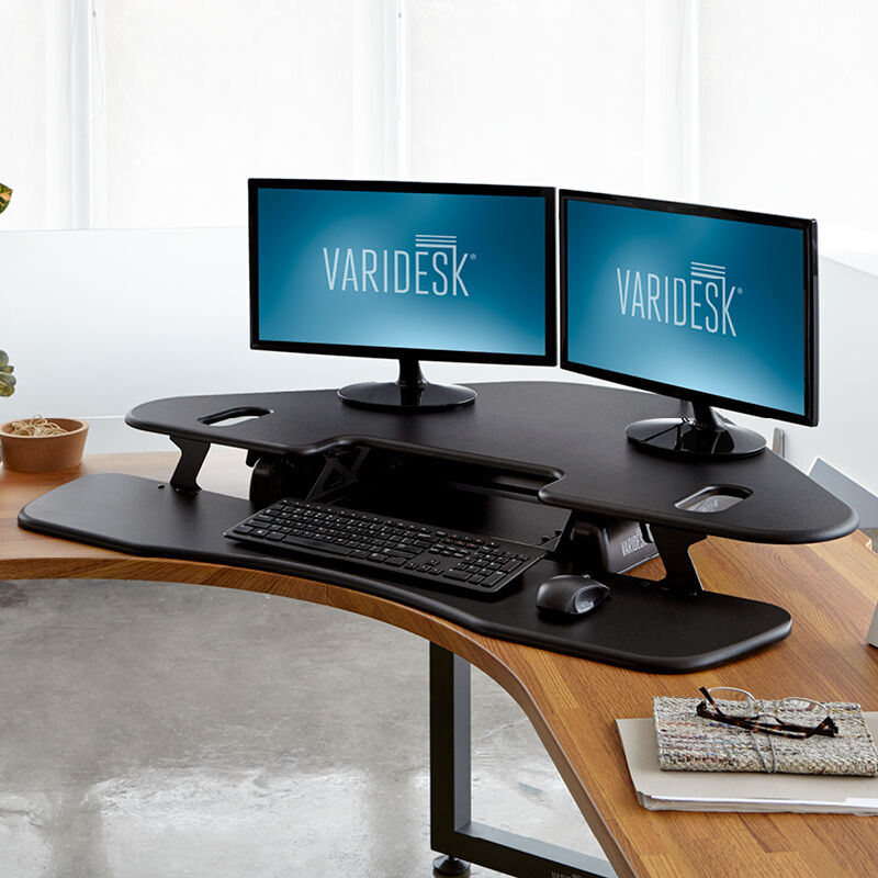 VariDesk Cube Corner 48 Black sit-stand desk converter lowered in office  image number null