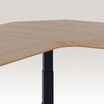 curved view of the walnut finish l shape electric standing desk