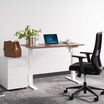 essential electric standing desk split top in lowered position