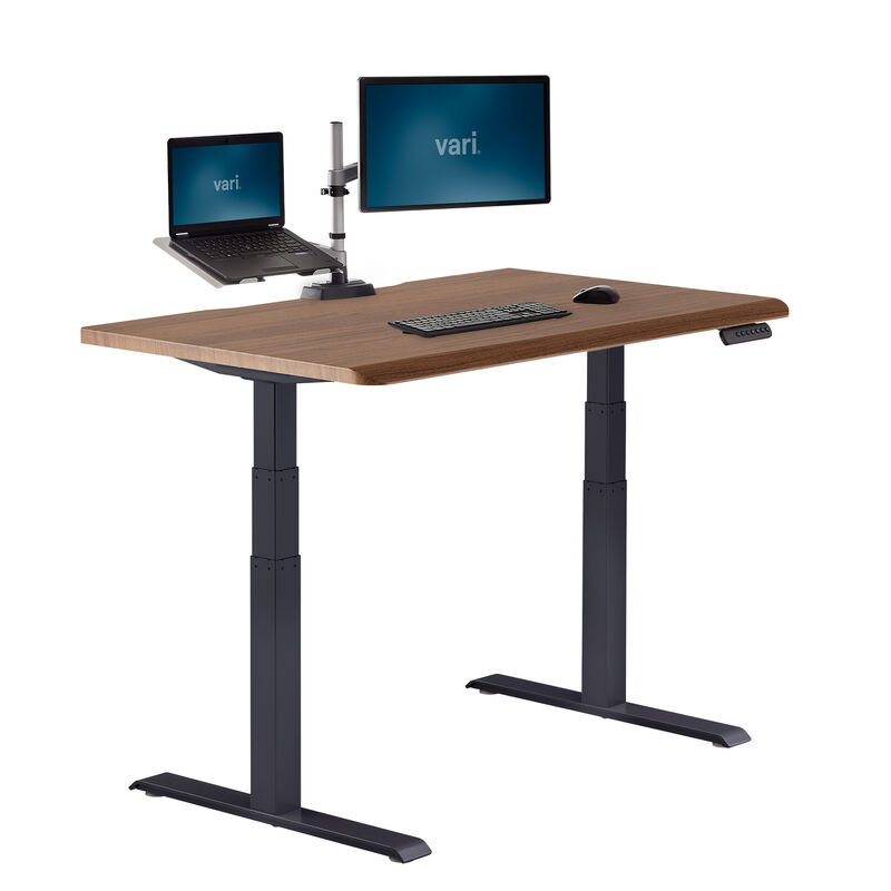 Electric Standing Desk with ComfortEdge in 48x30 Walnut in raised position image number null