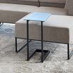laptop side table tucked into sectional sofa
