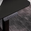 closeup of corner of vari essential electric standing desk 