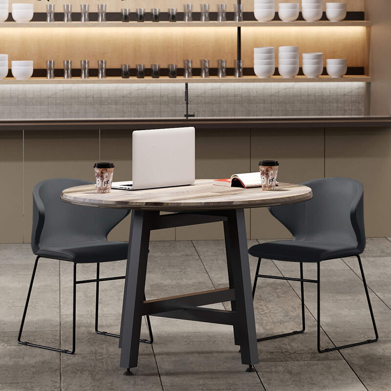 shadow grey cafe chairs around round table in lounge setting image number null
