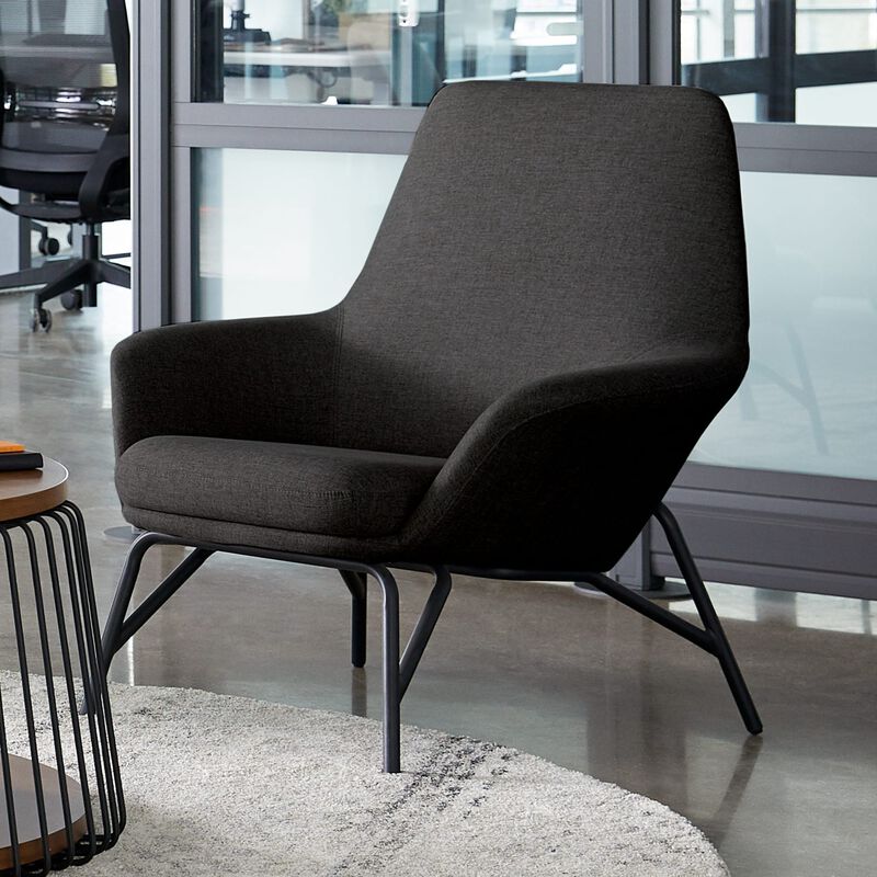 deep grey arm chair in office setting image number null