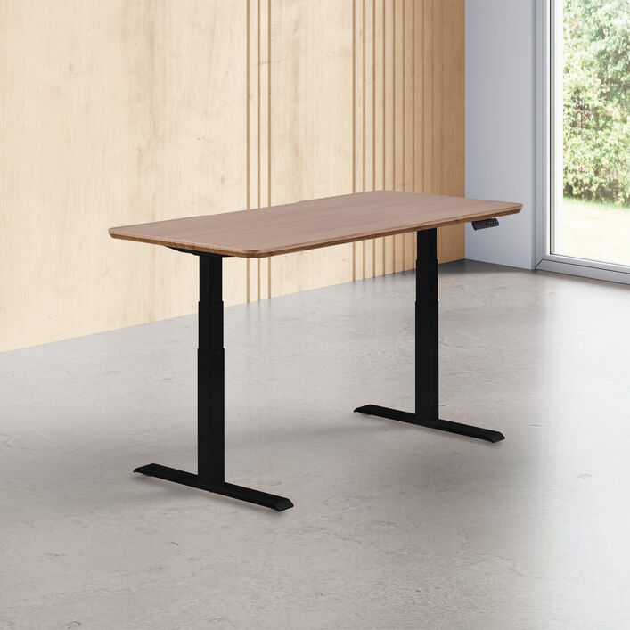 walnut finish standing desk top with black legs in a open office image number 0