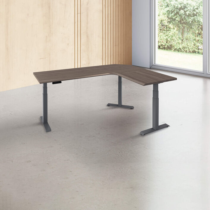 L-shape desk with a espresso wood finish desk top with slate legs in a open office image number 0