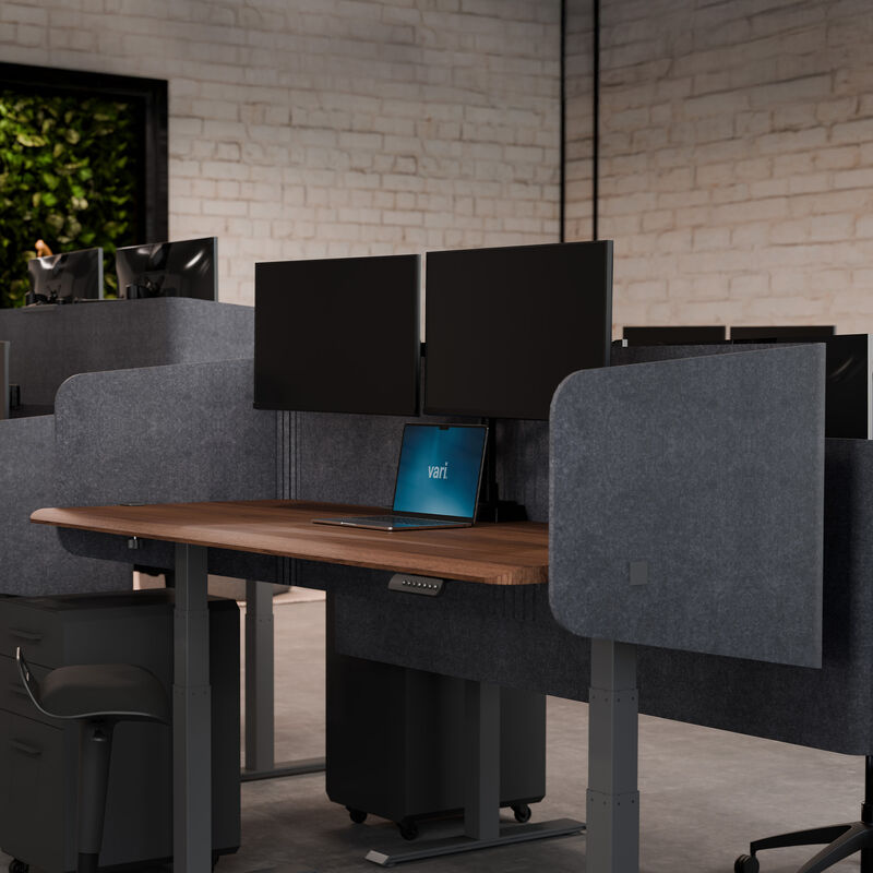 privacy desk surround 72 in light grey felt on an electric standing desk in walnut finish image number null