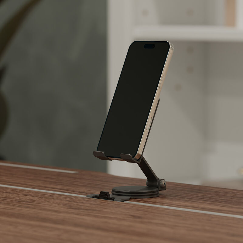 tech track phone stand attached to electric standing desk with phone image number null