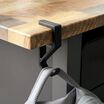 desk hook installed on the side of a desk